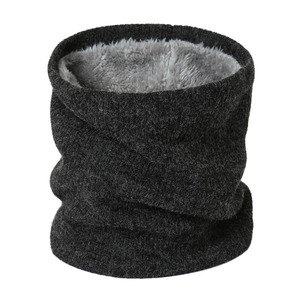 Detail of gray knitted neck warmer showing thick faux fur lining and ribbed texture