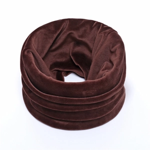 Detailed texture of dark brown velvet neck warmer showing soft high-density fabric