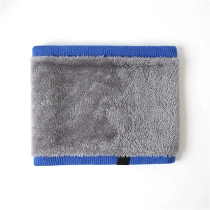 Detail of the soft faux rabbit fur lining and blue knit ribbing on winter neck warmer
