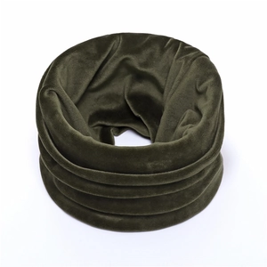 Detail view of dark green velvet neck warmer featuring soft pile texture and elegant draping