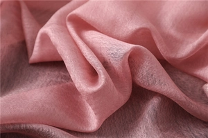 Detail of pink lightweight silk scarf with fine diamond texture and semi-transparent fabric