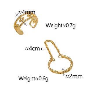 Detailed view of hollow star ear cuff and chain link earring with cubic zirconia accents