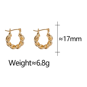 Detail of twisted gold earrings showing 17mm height and 6.8g weight measurements
