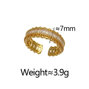 Detail view of gold adjustable ring with baguette zircon inlay and beaded edges