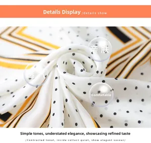 Detailed close-up of polka dot silk scarf texture showing smooth breathable fabric drape