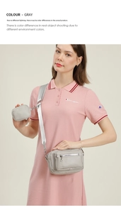 Gray leather crossbody camera bag with wide fabric strap and matching mini coin purse detail