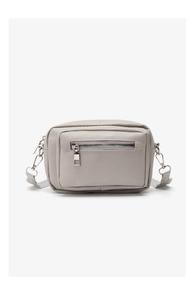 Front view of light grey faux leather crossbody bag with square metal zipper pocket