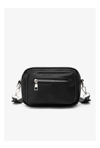 Front view of a black nylon crossbody bag with dual zipper pockets and silver metal hardware
