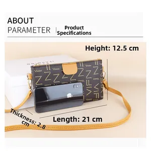Detailed size view of the brown monogram crossbody phone bag showing exact dimensions