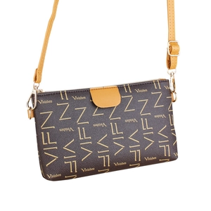 Chic brown monogram crossbody bag with yellow contrast strap and gold hardware