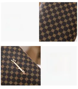 Détails du tissu PVC marron à motifs de trèfles et matériel doré Serengeti