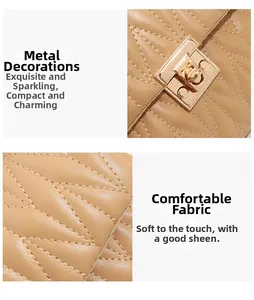 Close-up of golden square push-lock and quilted beige faux leather on women's bag