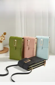 Vertical crossbody phone bag shown in green, pink, blue, and black with gold zippers