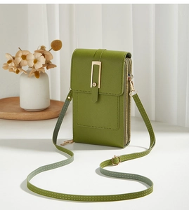 Vertical grass green crossbody phone bag with two zipper compartments and gold buckle