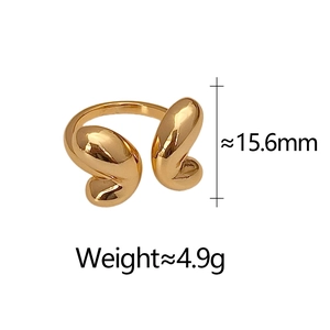 Detail view of gold butterfly open ring showing 15.6mm height and 4.9g weight specifications