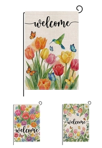 Détail des drapeaux de jardin de Pâques montrant la texture lin et motifs floraux