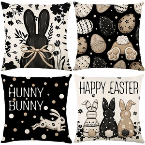 Set of four Easter pillow covers with black rabbit silhouettes and festive holiday patterns