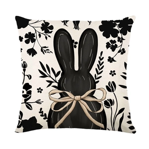 Easter bunny silhouette pillow cover with floral wreath patterns and a beige bow decor