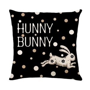 Easter decorative black pillow cover with Hunny Bunny text and white rabbit illustration