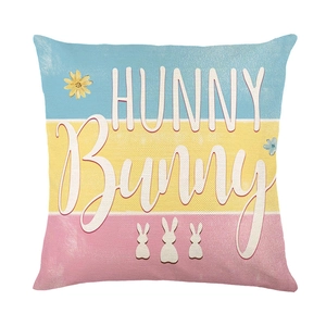 Easter cushion cover with HUNNY Bunny print and white rabbit silhouettes on tricolor background