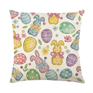 Easter throw pillow cover featuring watercolor rabbits and colorful eggs on linen fabric