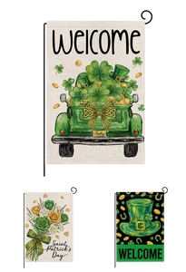 Detailed fabric texture of St. Patrick’s Day garden flags with festive shamrock designs
