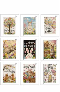 Detailed view of nine Easter garden flags featuring rabbits, eggs and linen texture