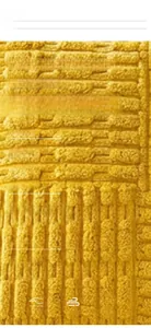 Detail of yellow corduroy cushion cover fabric showing soft 3D textured stripe pattern