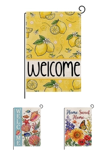 Detailed view of linen garden flags featuring floral and butterfly themes with metal stand