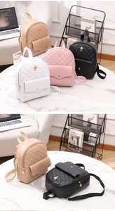 Detail of quilted leather mini backpacks in four colors with gold rose metal buckle