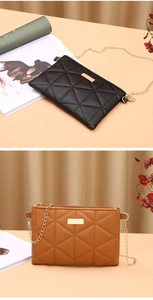Detail of black and brown quilted small square crossbody bags with golden chain straps