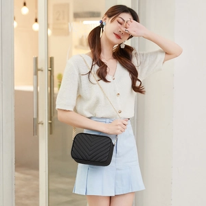 Classic black chevron quilted camera bag with gold chain strap for women