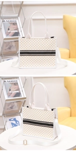 Detail of printed tote bag featuring yellow geometric patterns and black white webbing