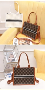 Detail of printed canvas tote bag with retro patterns and striped canvas texture