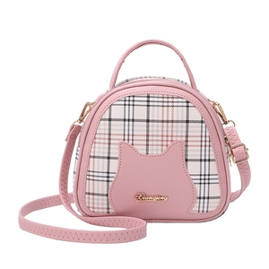 Pink checkered shell bag with cute cat ear design and adjustable shoulder strap