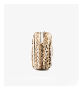 Detail of round straw bag with multi-color geometric stripes and golden metal D-rings