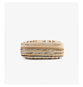 Detailed bottom view of woven crossbody bag with striped texture and white leather trim