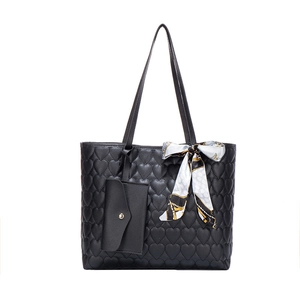 Black heart-quilted tote bag with silk scarf and matching envelope charm pouch