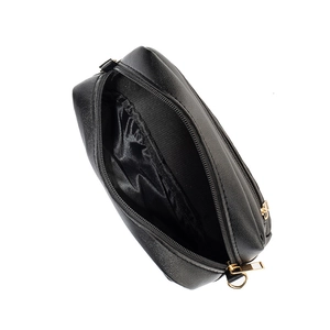 Women's black shoulder bag with wave embroidery and gold zipper showing interior
