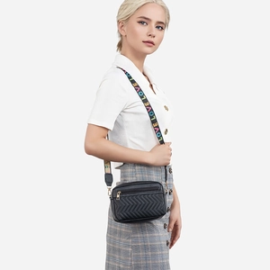 Black quilted crossbody bag with colorful LOVE embroidered strap and gold hardware