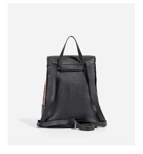 Detail view of the black bucket backpack with adjustable straps and drawstring closure