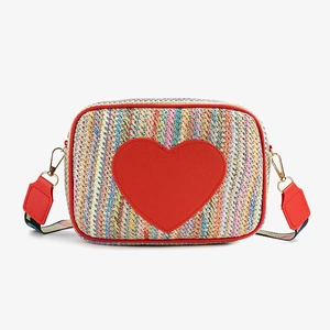 Colorful woven straw shoulder bag with red heart patch and adjustable wide strap