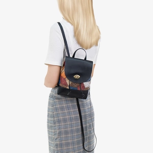 Patchwork leather drawstring backpack with color-blocking design and gold-tone hardware