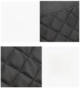 Gros plan sur la texture du cuir noir matelassé avec coutures précises et finitions
