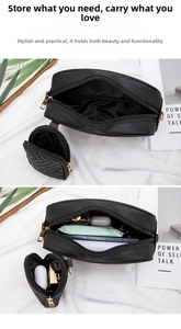 Detail of black crossbody bag set showing spacious interior for phone and cosmetics