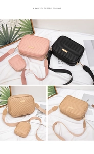 Detail of chevron quilted crossbody bag set with matching coin purse and wide strap