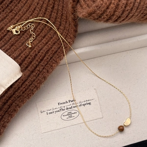 French vintage tiger eye stone gold necklace with round brown bead and bean pendant