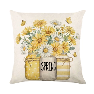Housse de coussin printanière avec marguerites jaunes et motif 'SPRING' sur tissu lin