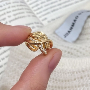 Minimalist gold-plated multi-layer ear cuff featuring sparkling cubic zirconia stones