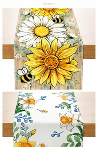 Detail of linen table runner with vintage sunflower daisy and honeybee floral prints